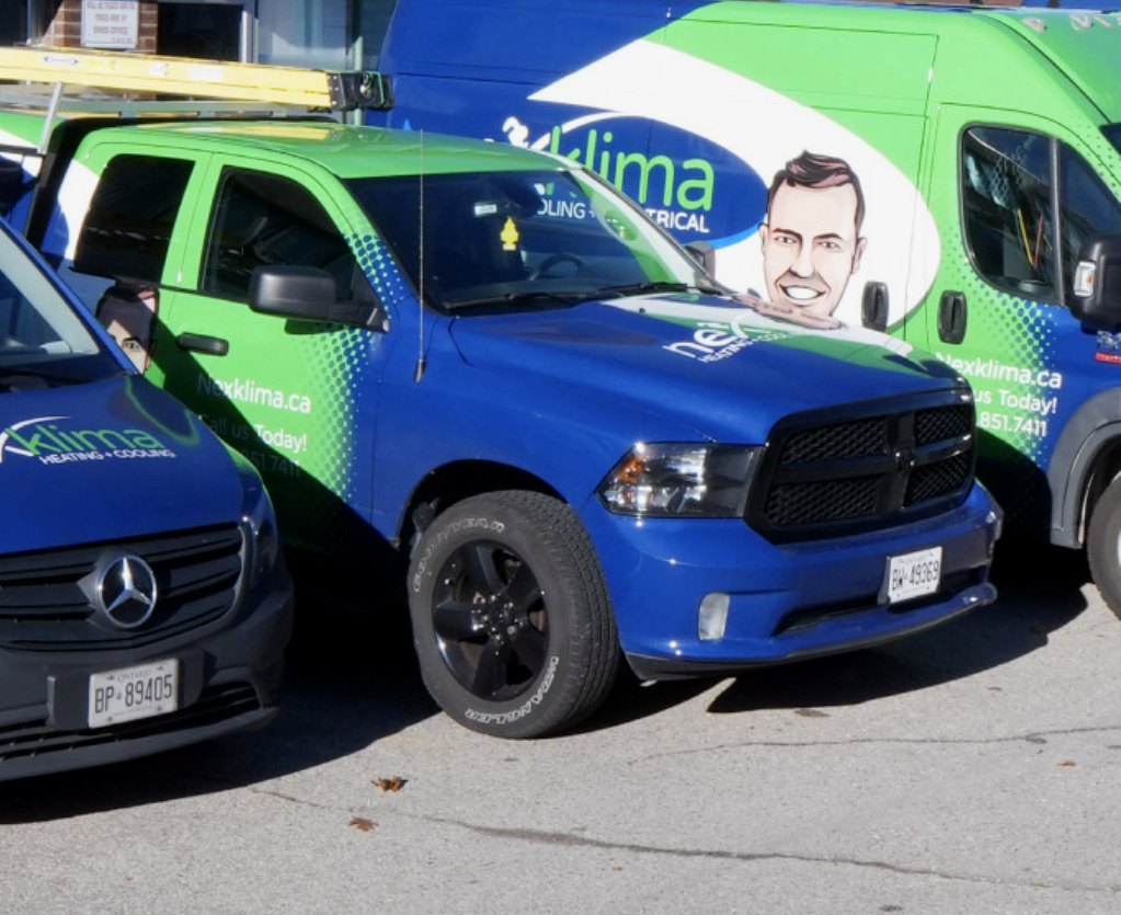 Nexklima service trucks parked and ready for dispatch